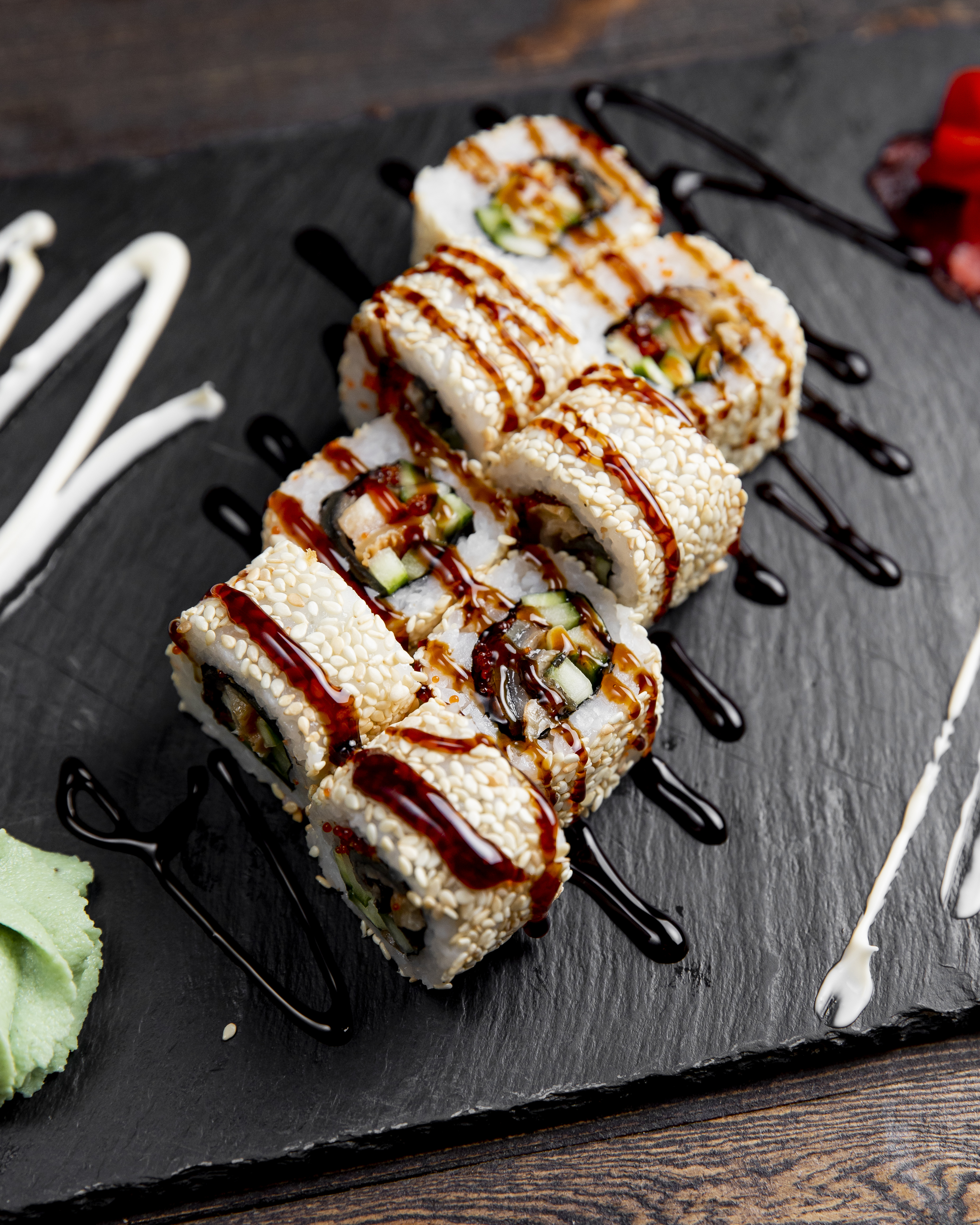 sushi-rolls-with-sesame-seeds-served-with-sauce-wasabi.jpg